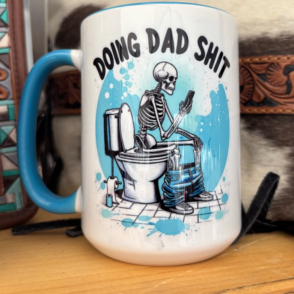 Humorous Skeleton Mug with Blue Handle